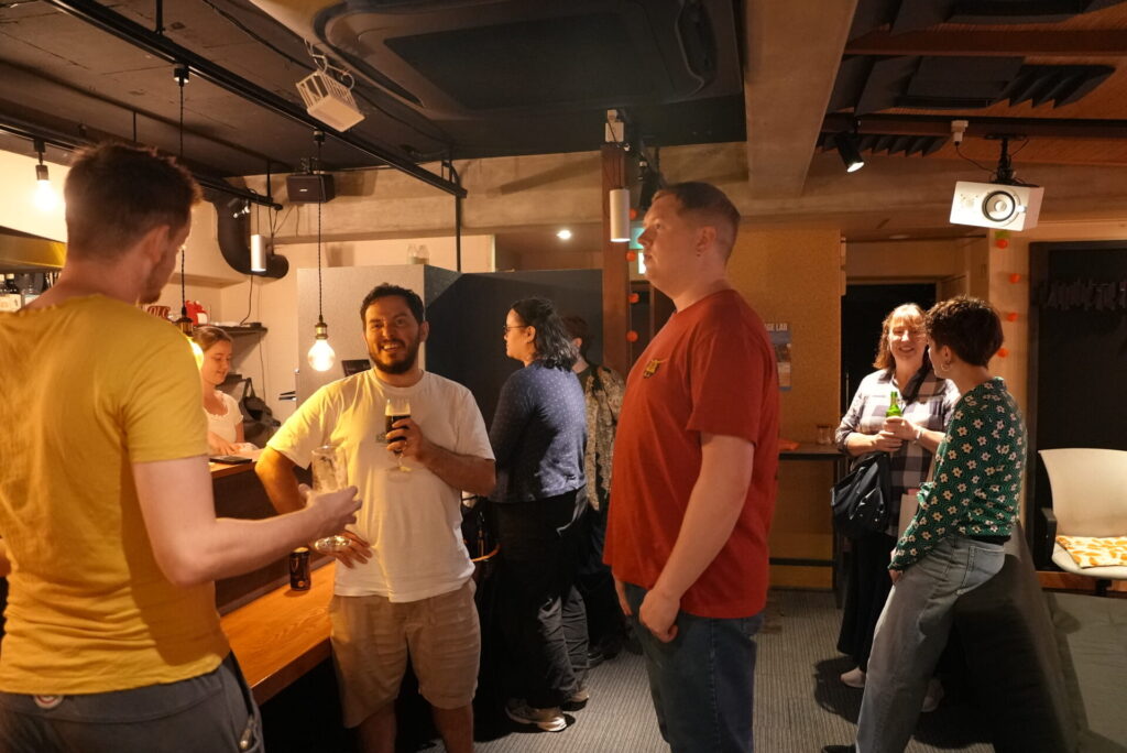 Guests mingling with drinks