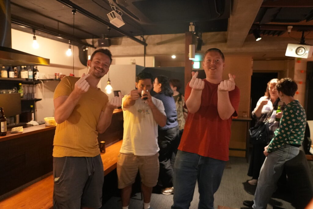 A team raising their drinks and having fun at Cloud Infinity