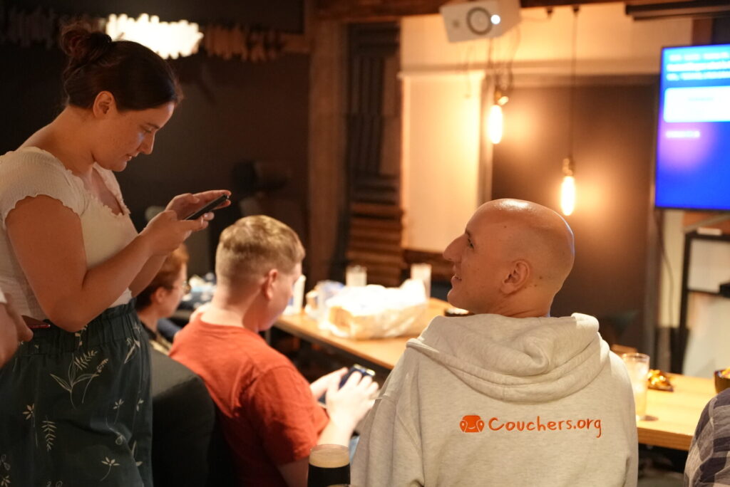 Guests playing a game on their phones